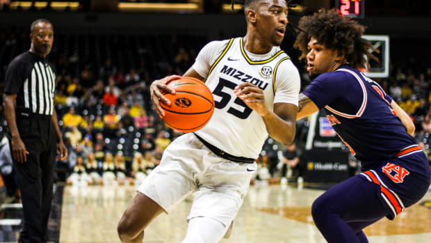 Mizzou men's basketball guard Sean East II attempts to get past an Auburn defender Tuesday at Mizzou Arena in Columbia